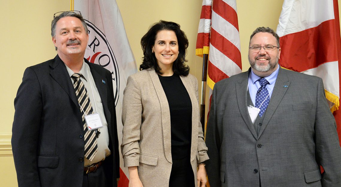 Professors pose for photo at NATO Conference