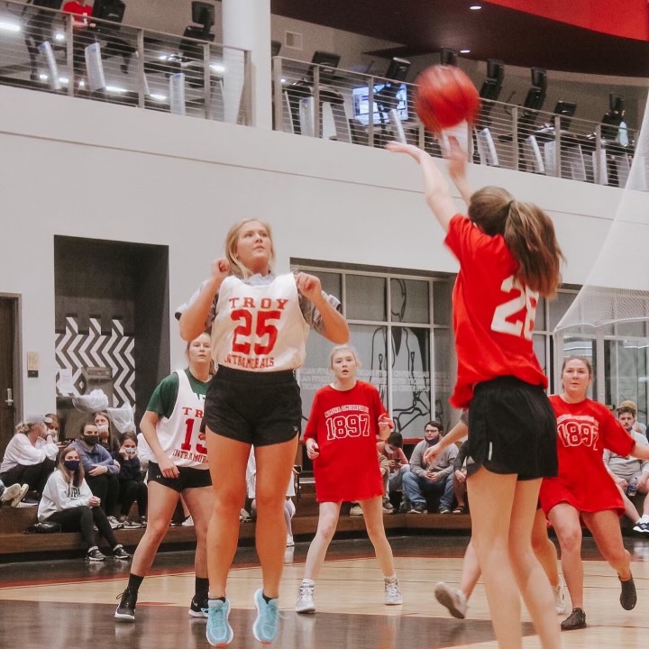 Students playing intramural basketball.