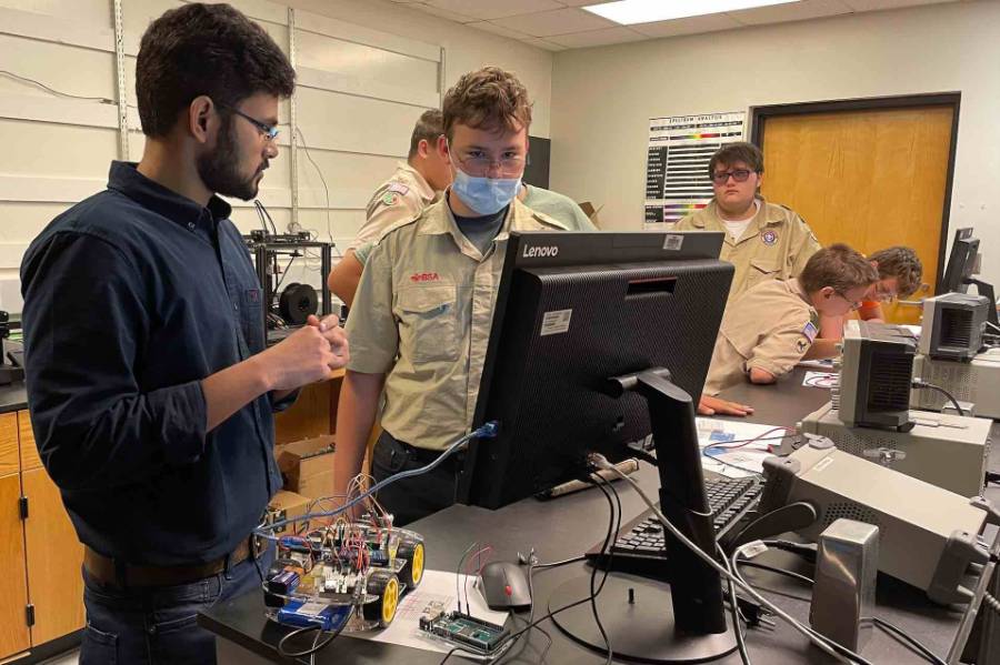 EET faculty participating in Boy Scout robotics program