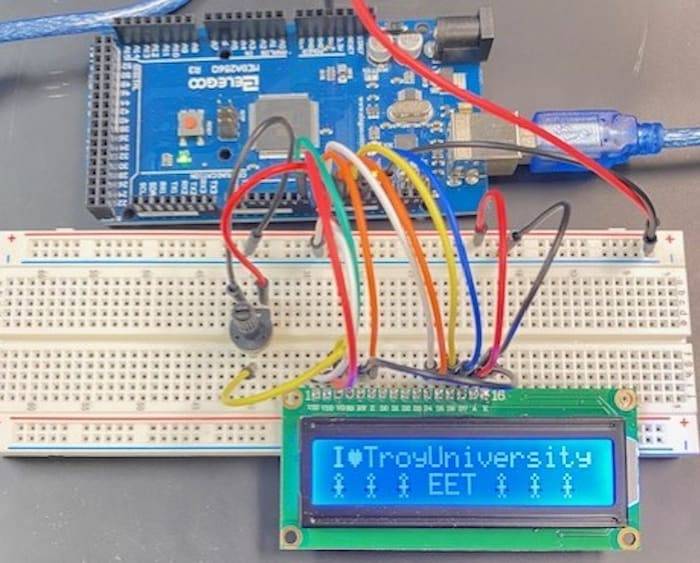 microntroller LCD interface displaying I love EET program 