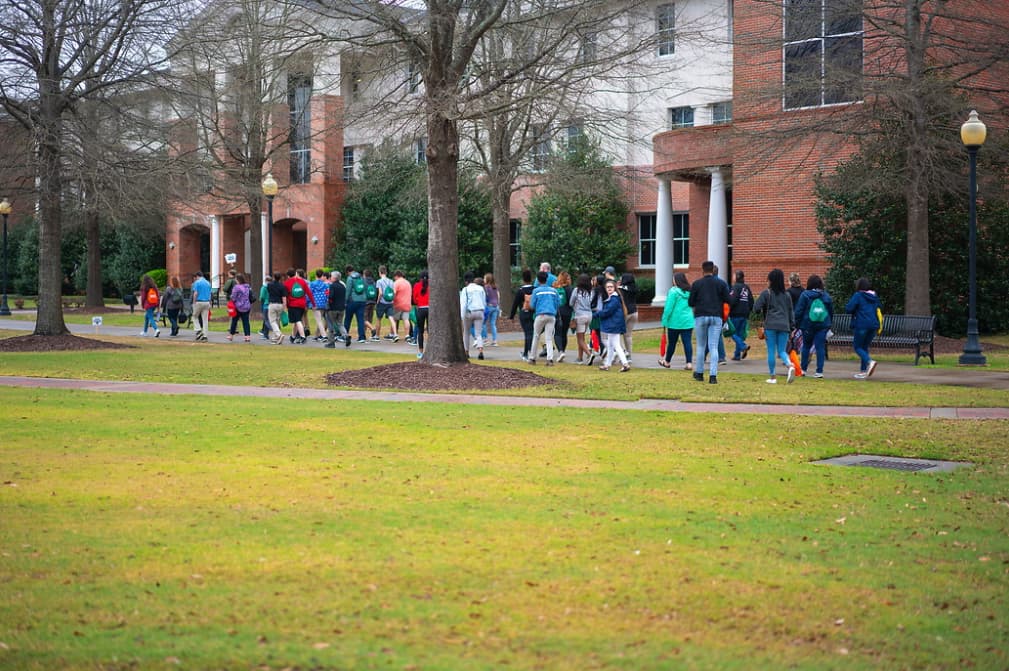 High school students walk across Troy campus to Geo Day session locations