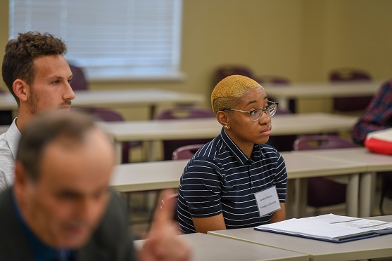 Participants at a student presentation