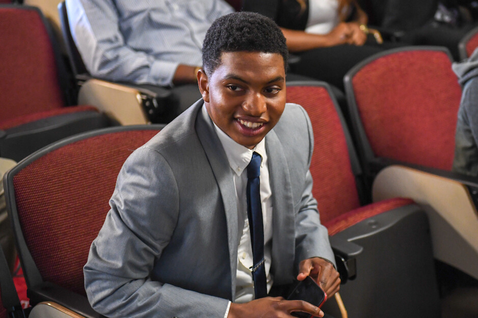 Student sitting in auditorium