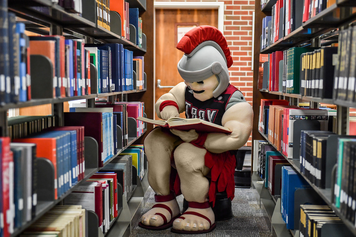 T-roy studying in the library