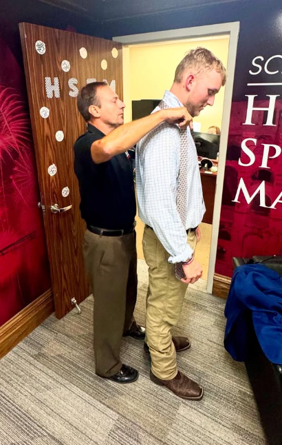 Dr. Mathner Teaching Brooks to Tie a Tie