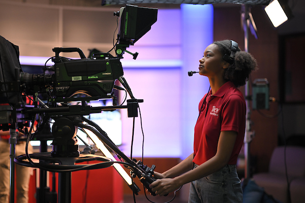 TROY student filming Trojan Vision