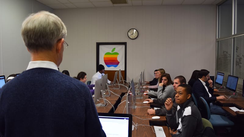 Professor Steve Stewart teaches a class of journalim students.