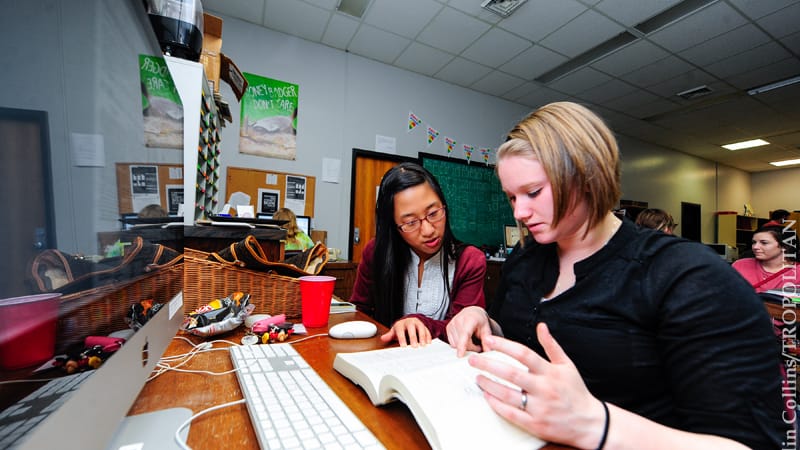 Student reporters research a story for the Tropolitan