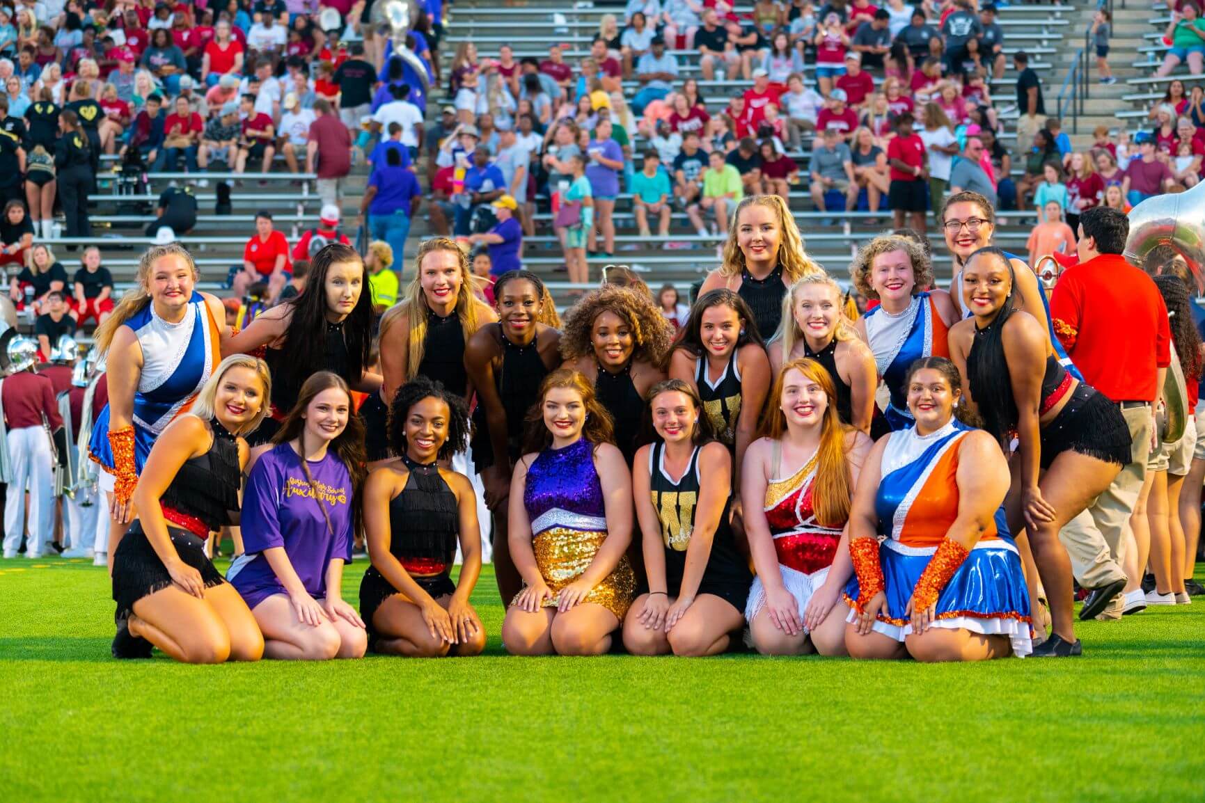 College and High School dancers smiling at Band Day