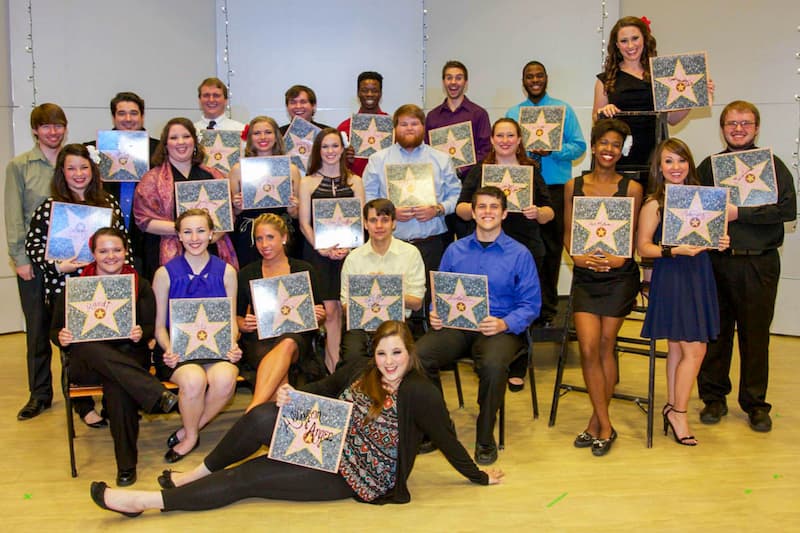 Participants in the Opera Workshop pose for a group picture