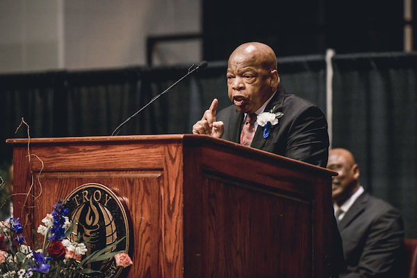 Lewis speaking at conference