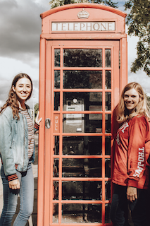 Girls at phone booth