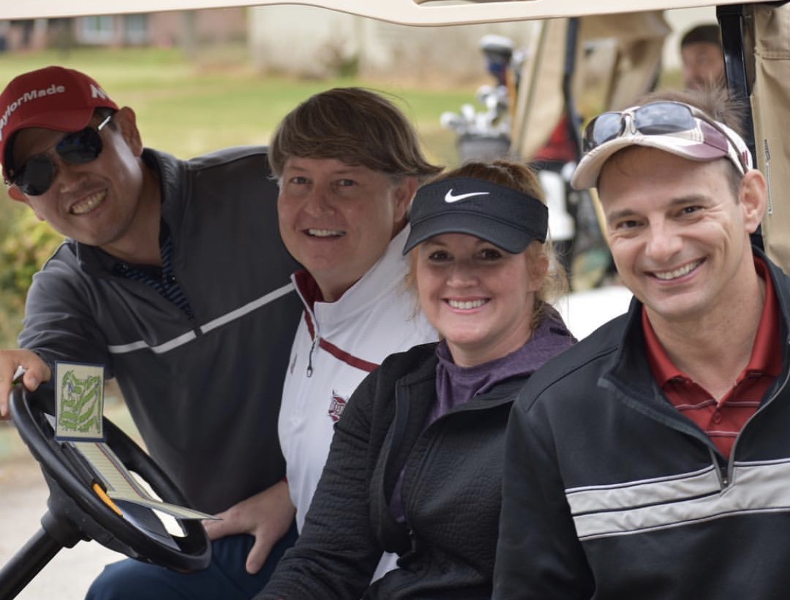 HSTM faculty overseeing the golf tournament