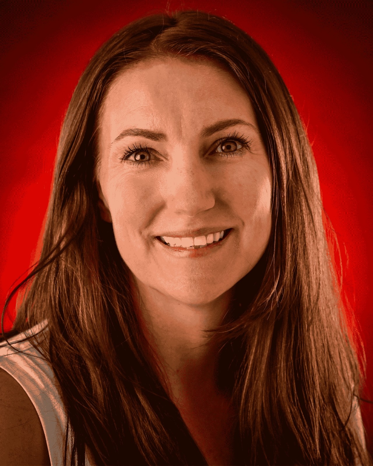 Maranda Fain Headshot with a red background