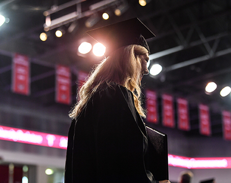 Photo of graduate at commencement