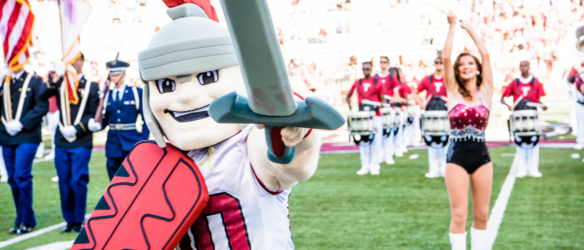 T-Roy and The Sound of the South Marching Band performing at a TROY football game.