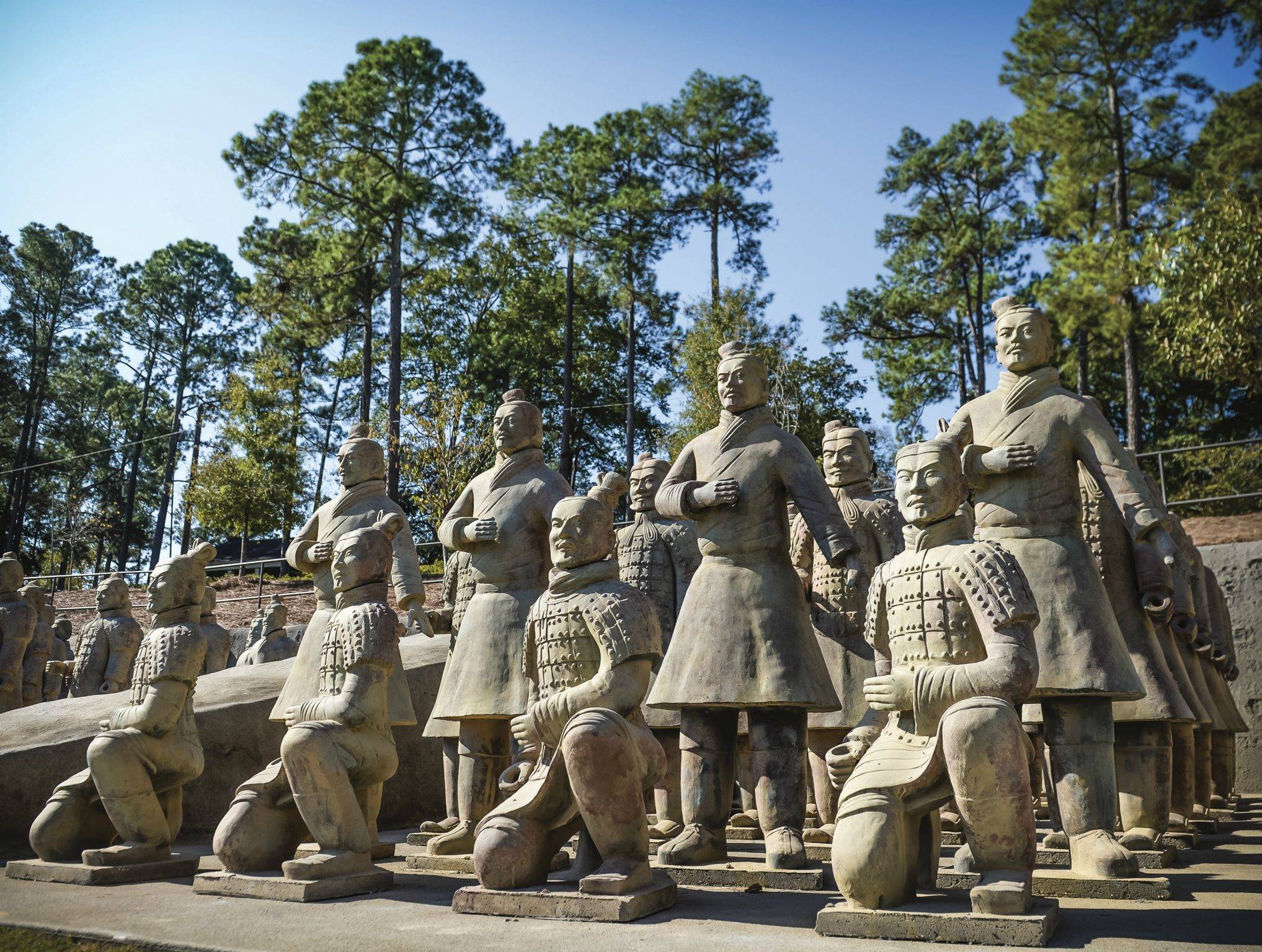 Terra cotta archers kneeling and standing in pit 3 at the Janice Hawkins Cultural Arts Park