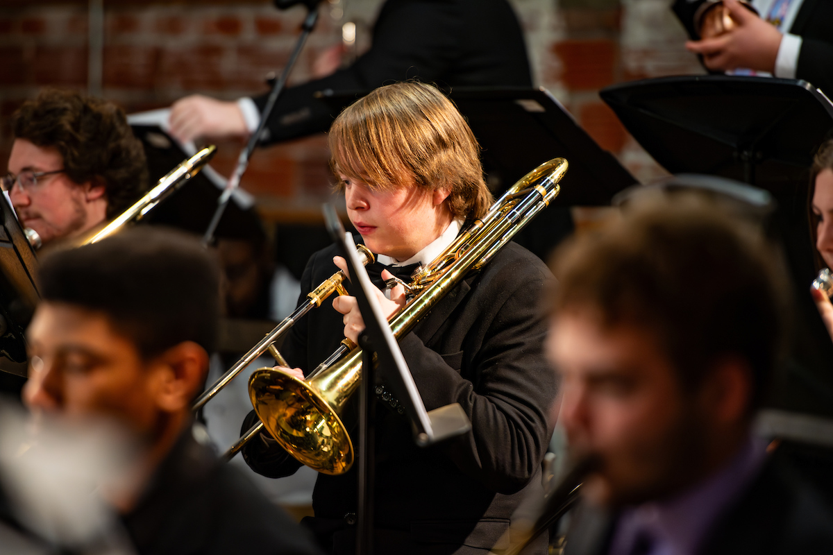 Students playing instruments in the band