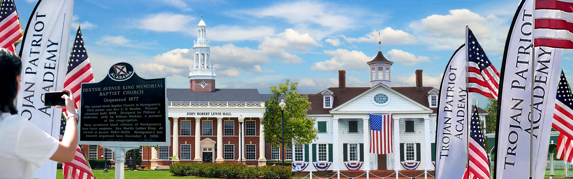 Wide angle photograph of Troy University's campus and American Village