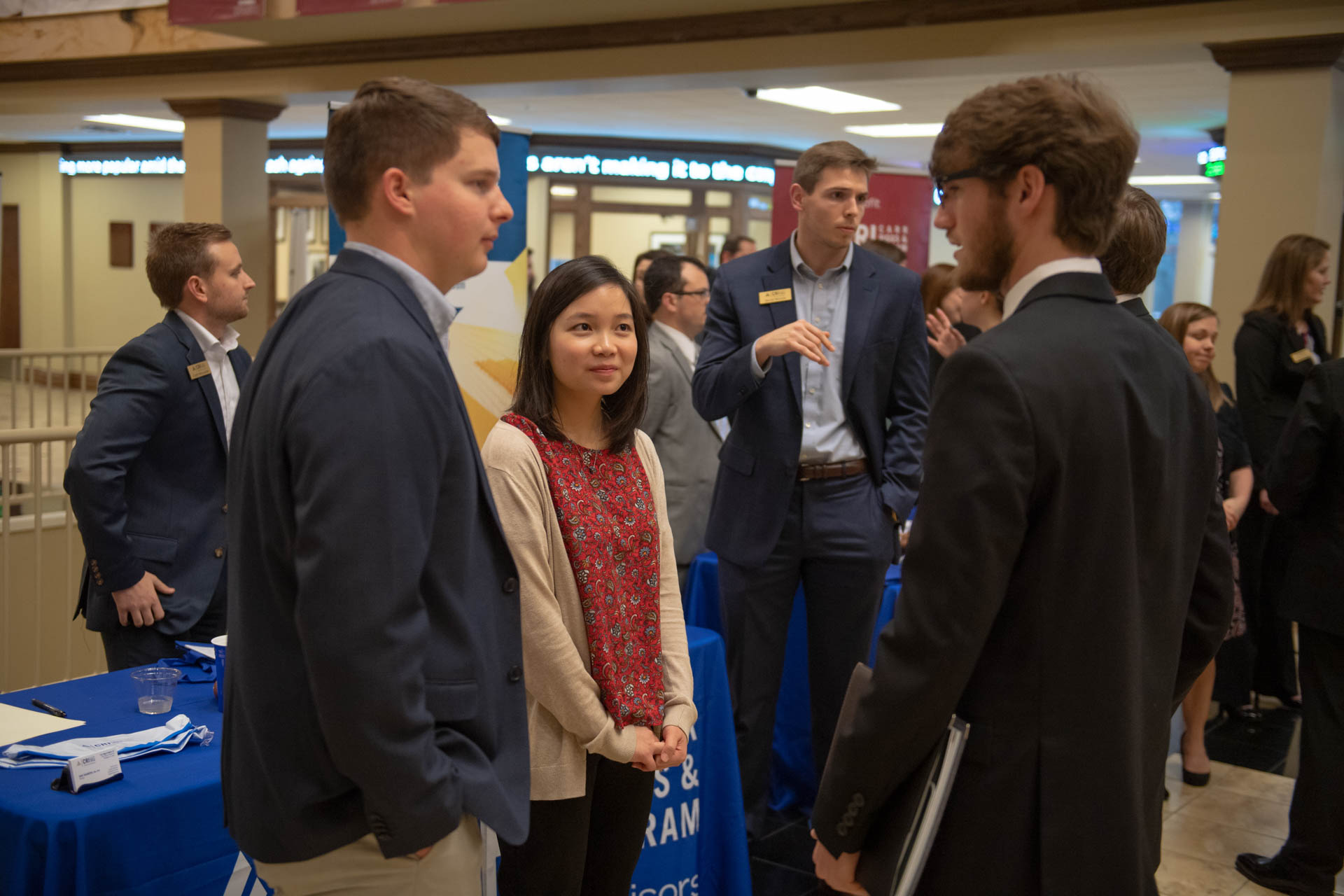 Students talking with one another at career fair