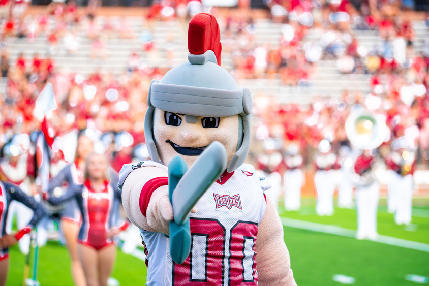 T-Roy on the football field with a foam sword