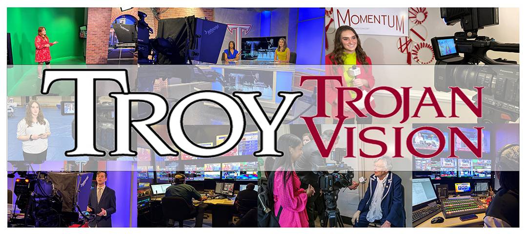 TROY TrojanVision Banner showing students in various bradcast news positions.