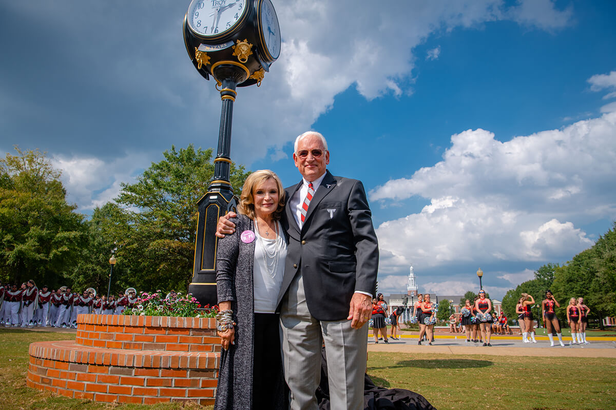 TROY celebrates honoring Dr. Jack Hawkins, Jr for 30 years as Chancellor by situating clock in front of Smith Hall. 