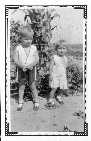 [June 17] 1932,  Kenneth Simmons (left), born May 3, 1928; with Marjorie Simmons, born July 4, 1929.