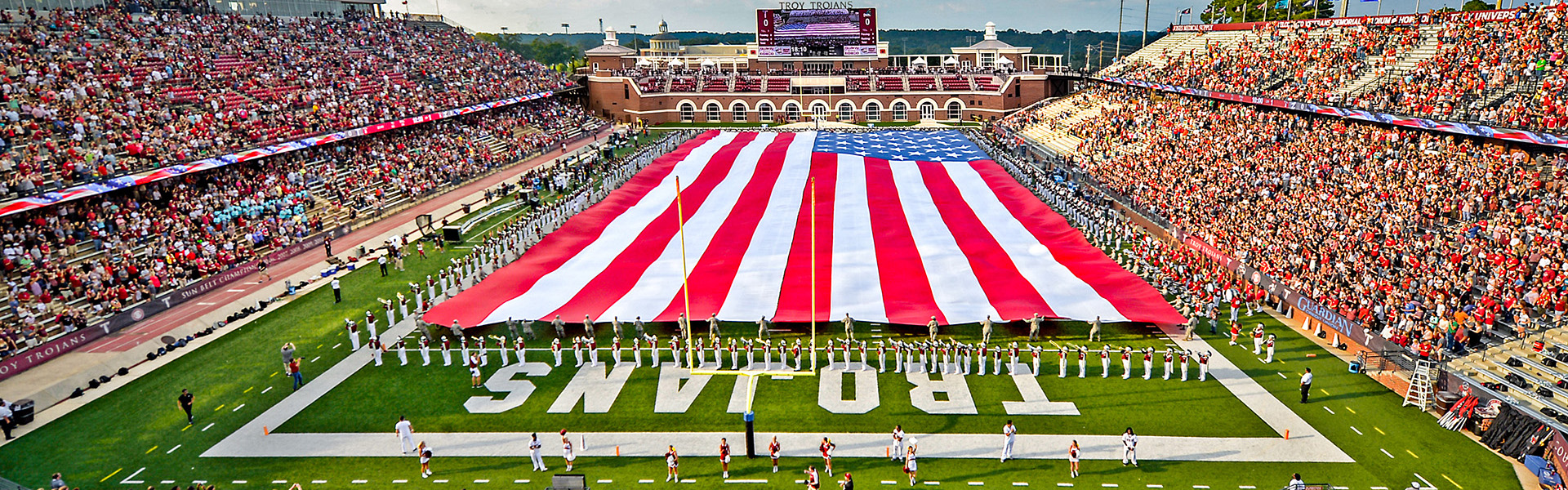 Giant flag on field at Veterans Memorial Stadium